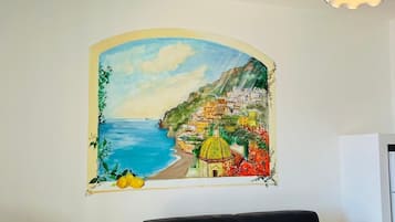 Familie appartement, balkon, uitzicht op zee (3 persone) | Woonruimte | Een televisie