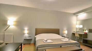 Habitación con 1 cama matrimonial o 2 individuales (Double Occupancy) | Ropa de cama de alta calidad y camas Select Comfort