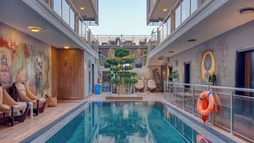 Seasonal outdoor pool, open 7:30 AM to 7:00 PM, free pool cabanas