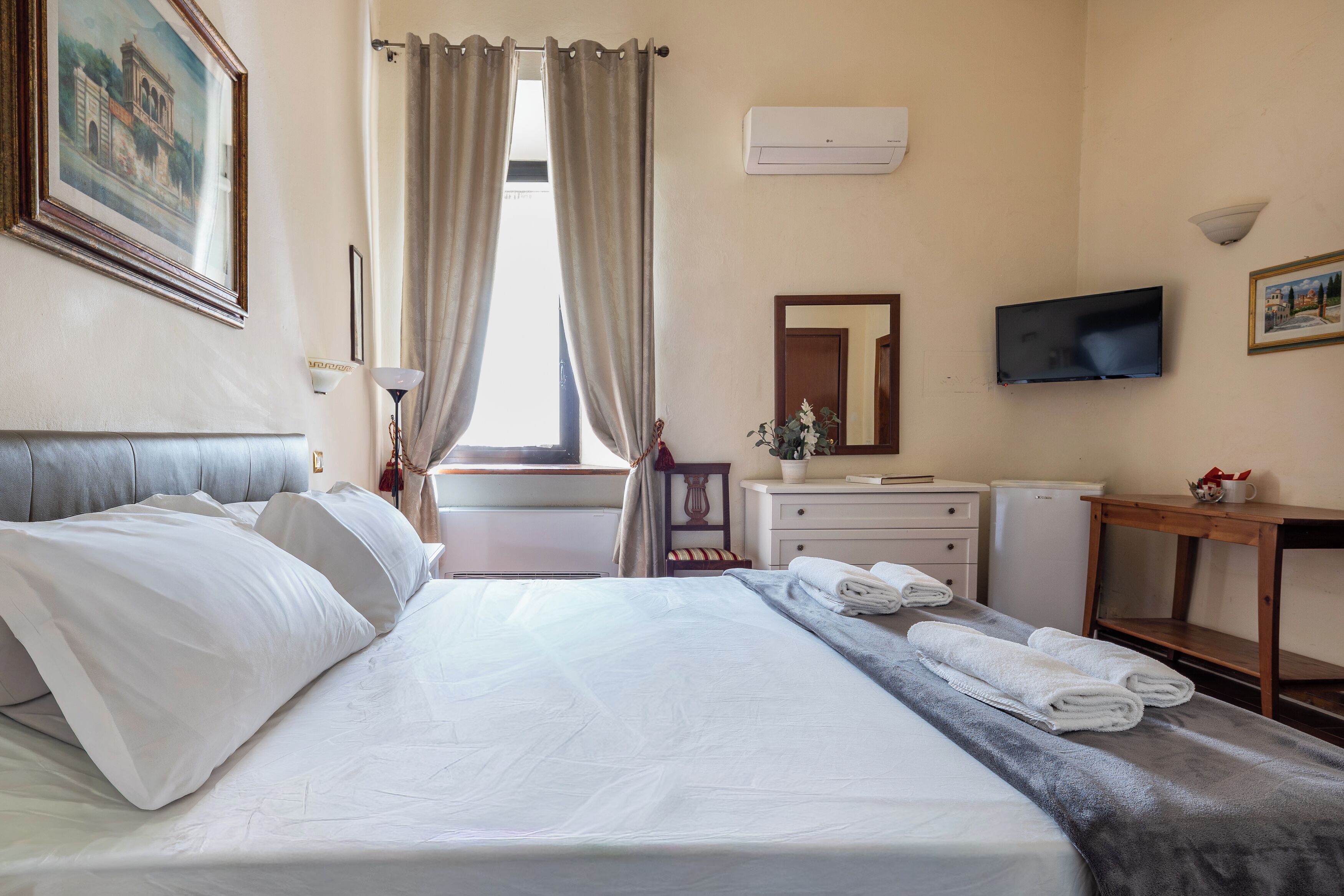 Double or Twin Room | Minibar, in-room safe, individually furnished, iron/ironing board