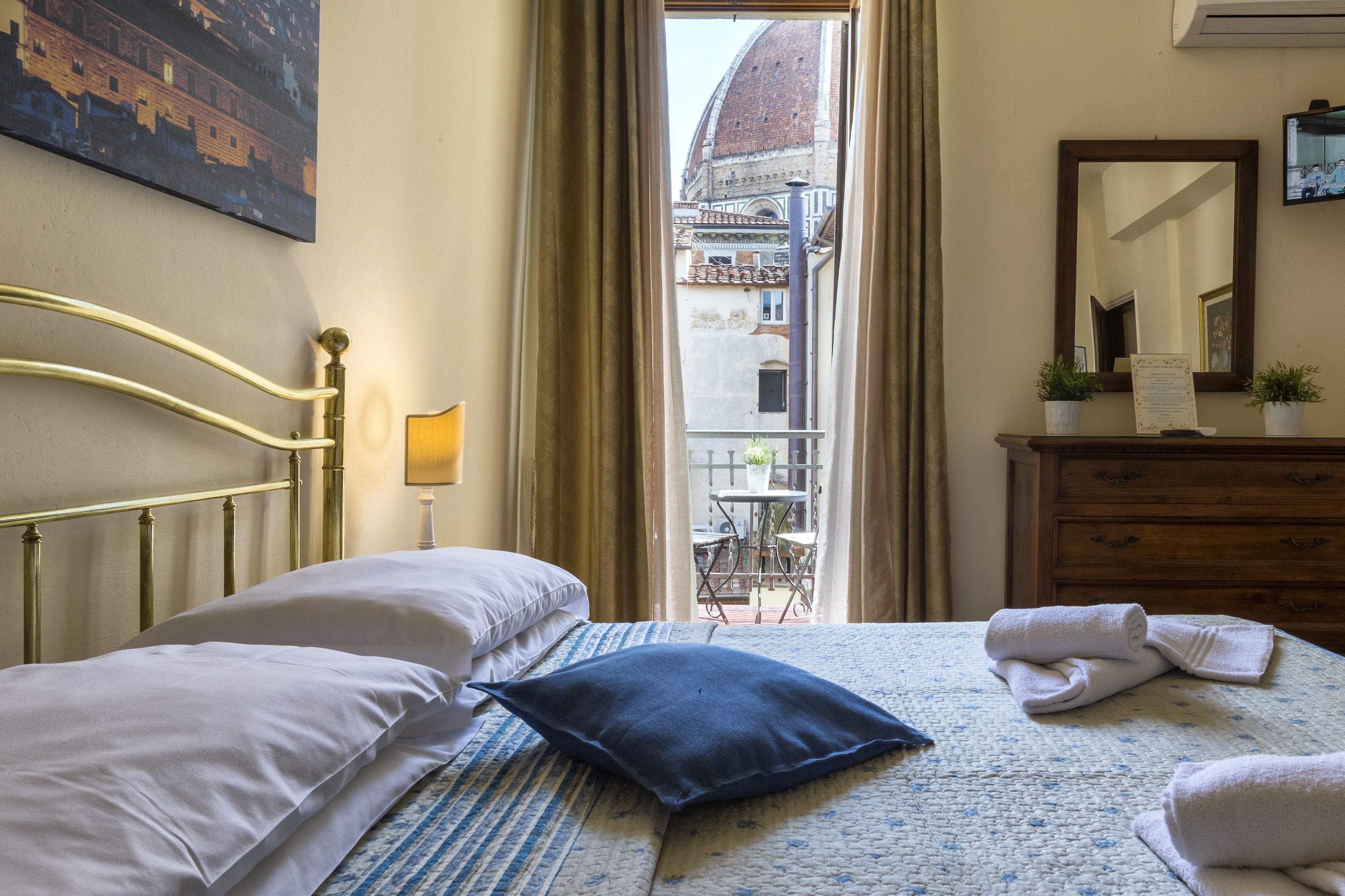 Superior Double Room, Private Bathroom (Duomo view) | Minibar, in-room safe, individually furnished, iron/ironing board