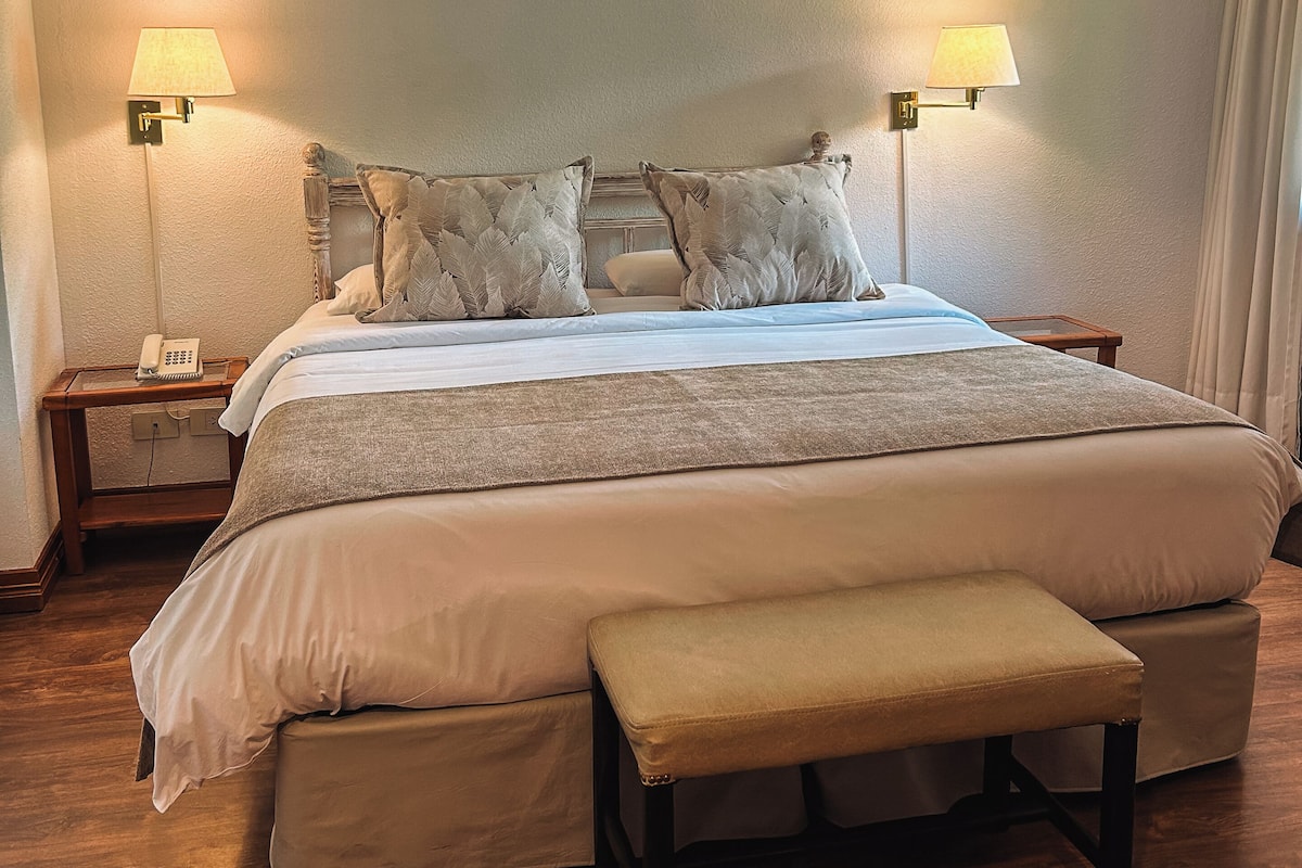 Family Room, Kitchenette | Premium bedding, minibar, in-room safe, blackout drapes