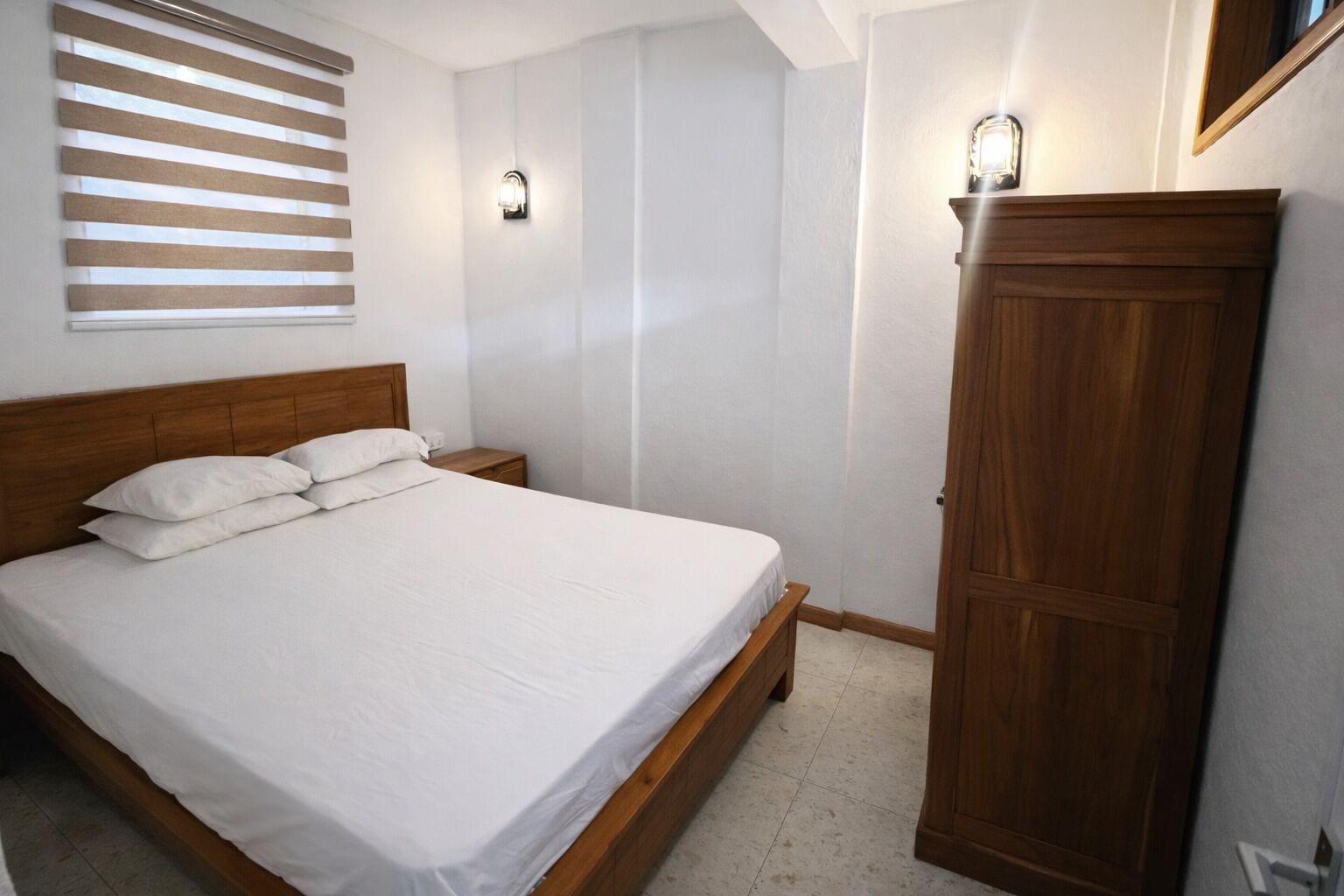 Lejlighed | Minibar, individuel indretning, mørklægningsgardiner, sengetøj