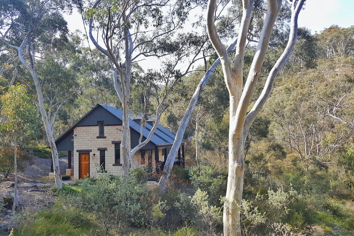 Comfort Cabin, 1 Queen Bed, Hot Tub, River View | 1 bedroom, individually decorated, individually furnished