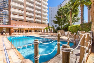 Seasonal outdoor pool, open 10:00 AM to 8:00 PM, pool umbrellas