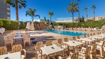 Seasonal outdoor pool, open 10:00 AM to 8:00 PM, pool umbrellas