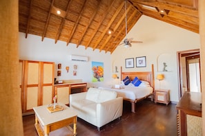 Beachfront Cottage | Living area | 42-inch LCD TV with cable channels, TV