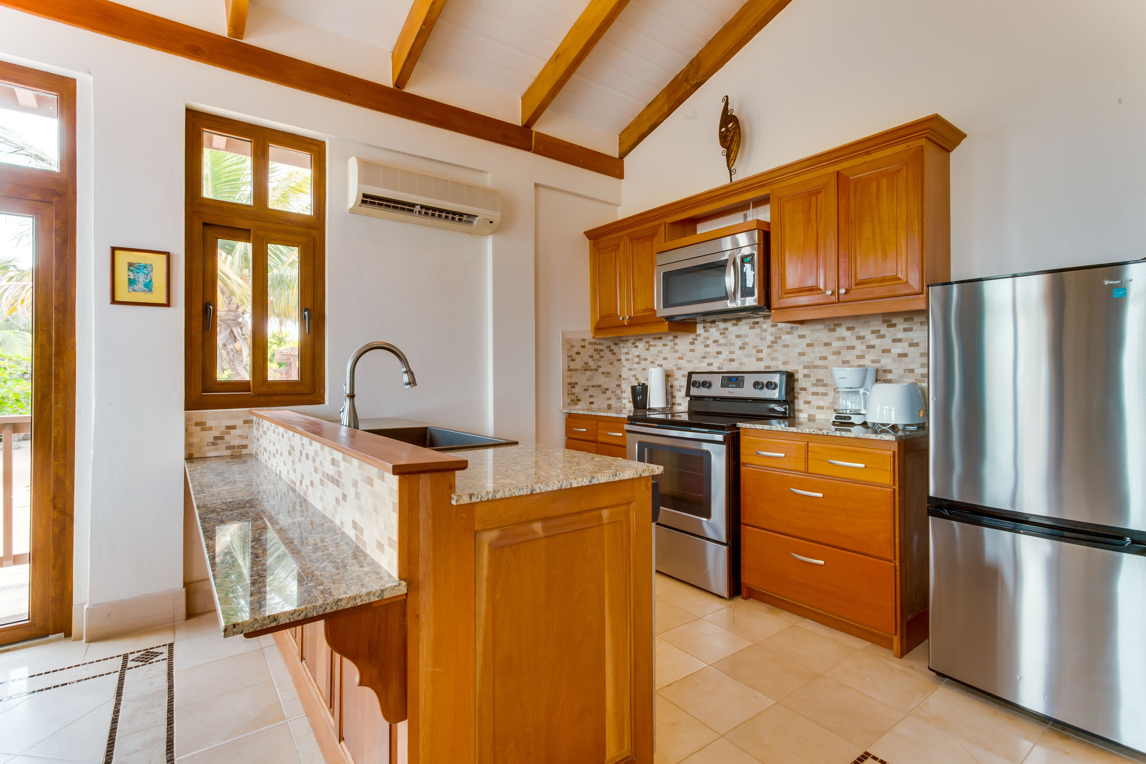suite, 2 bedrooms, beachfront | private kitchen | fridge, coffee/tea maker