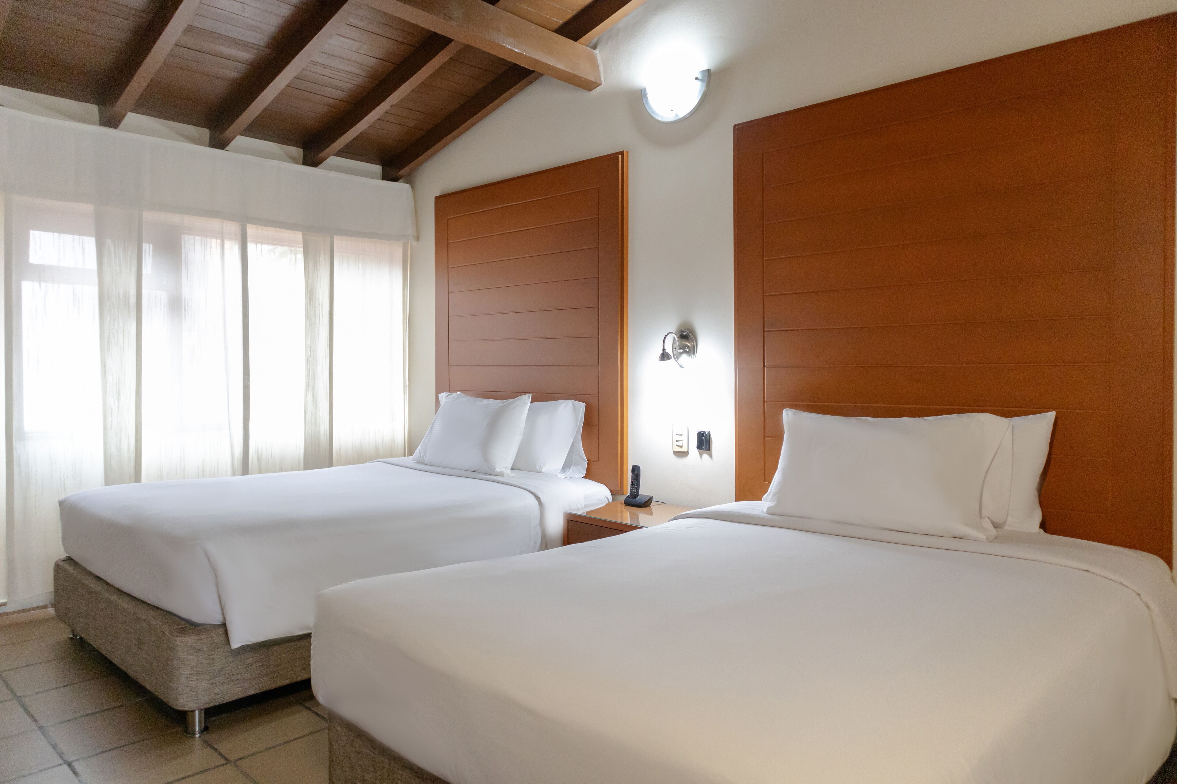 Executive Quadruple Room | Premium bedding, minibar, in-room safe, free WiFi
