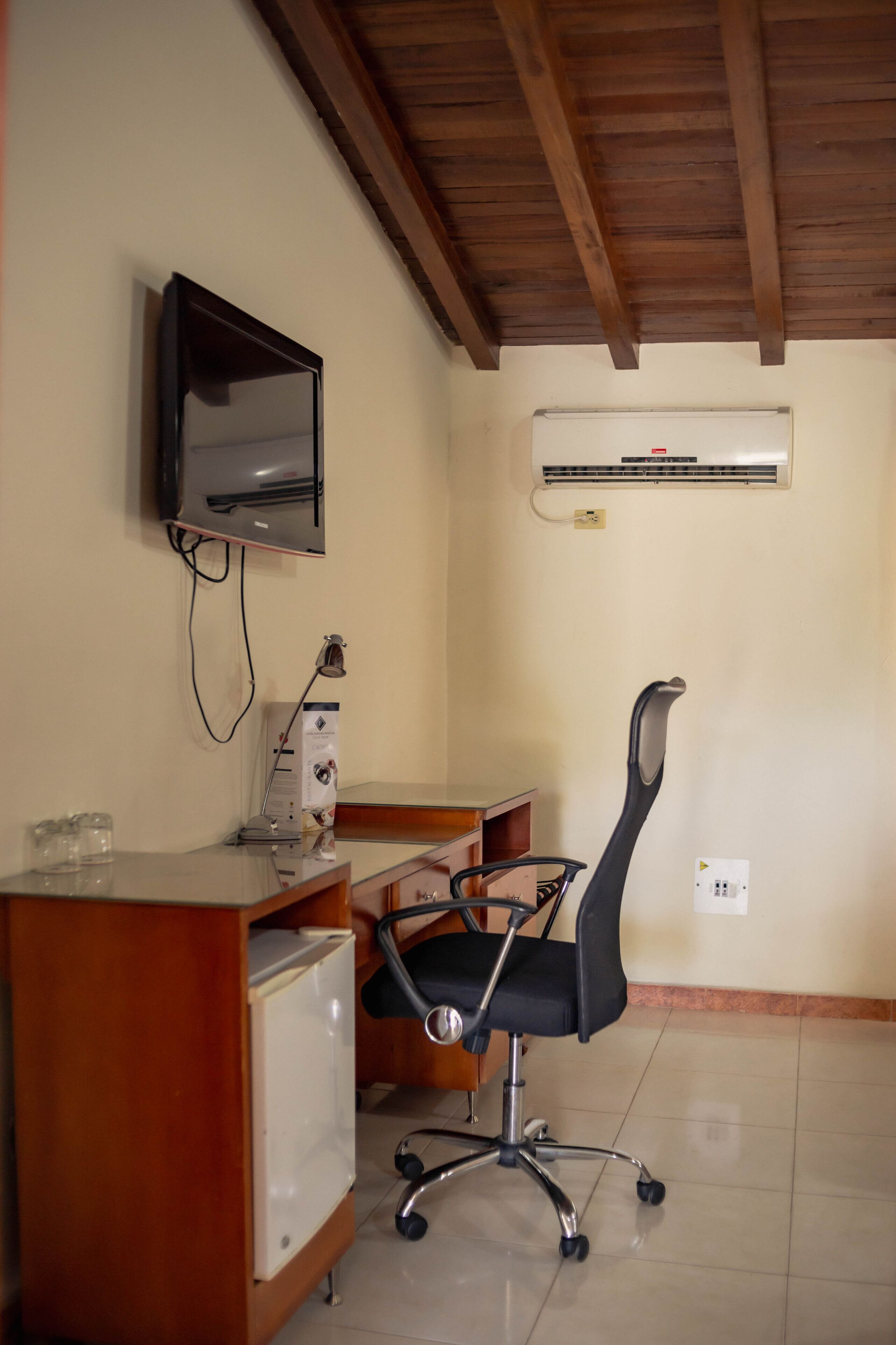 junior quadruple room | living area | lcd tv