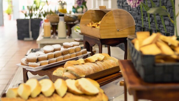 A buffet setup with various baked goods and pastries on display. - Hotel Faranda Bolivar Cucuta, a member of Radisson Individuals (San José de Cúcuta)