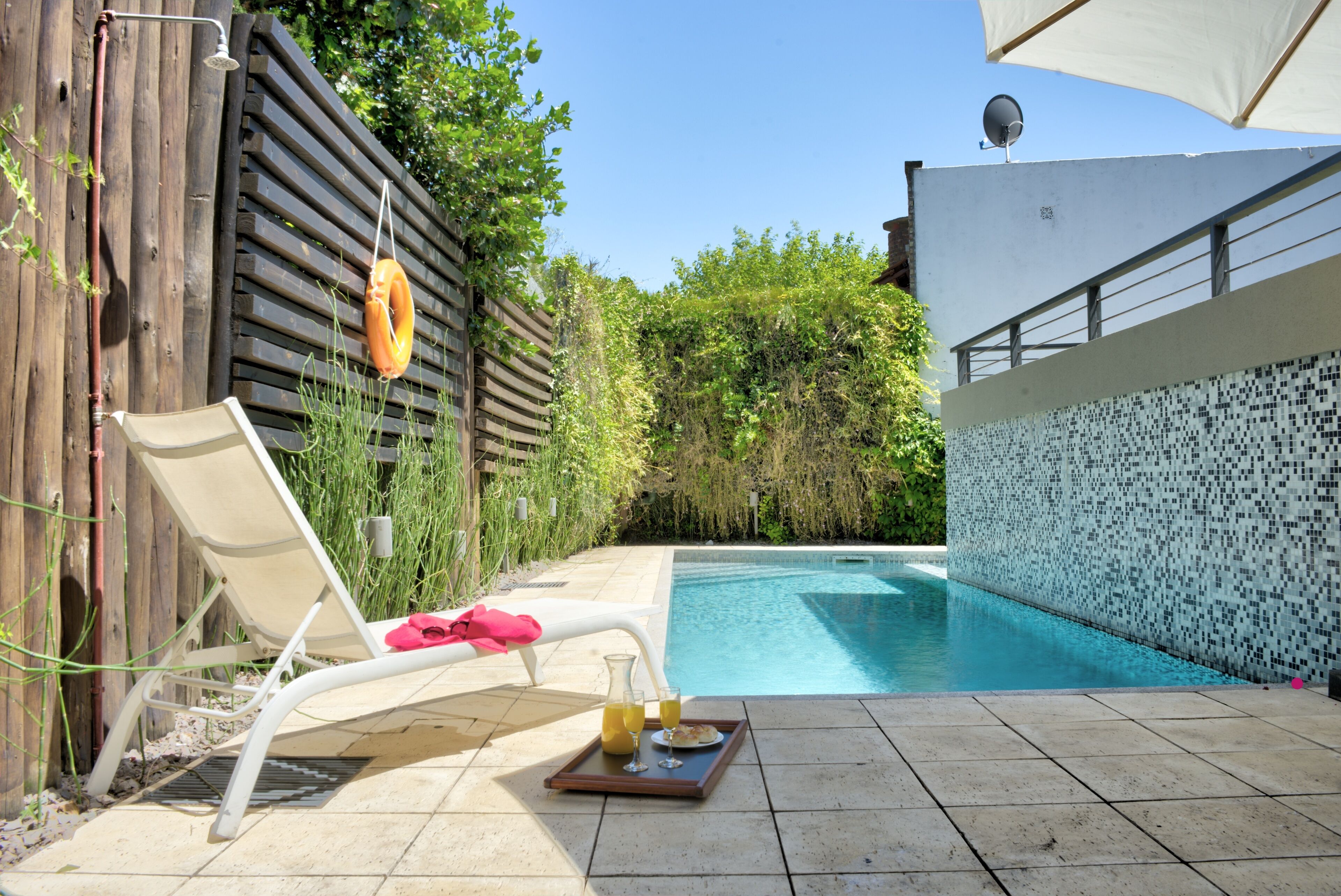 Outdoor pool, pool umbrellas, pool loungers