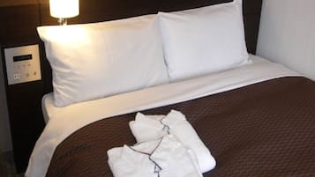 Down duvets, desk, laptop workspace, blackout curtains