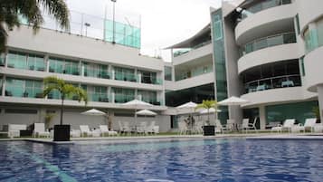 Outdoor pool, pool umbrellas, sun loungers