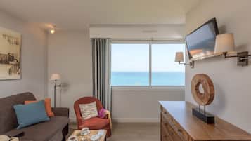 Suite, Partial Sea View | Living room | 22-inch flat-screen TV with digital channels, TV