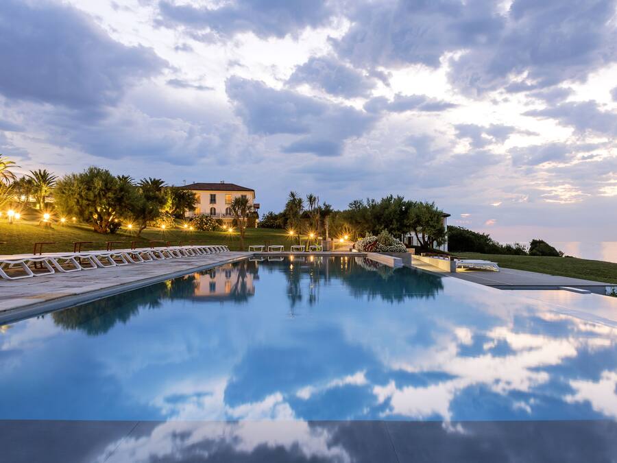 Seasonal outdoor pool, pool umbrellas, pool loungers