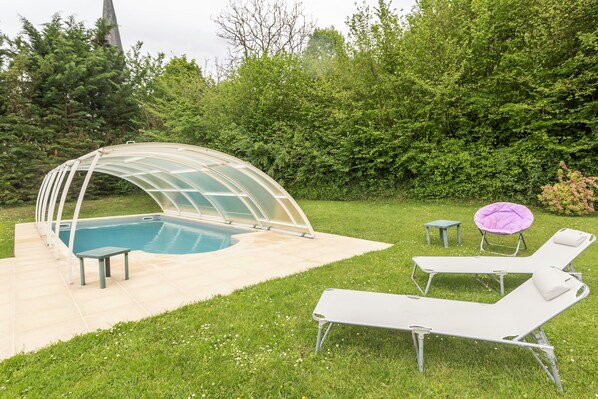 Seasonal outdoor pool, pool umbrellas, pool loungers