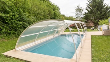 Seasonal outdoor pool, pool umbrellas, pool loungers