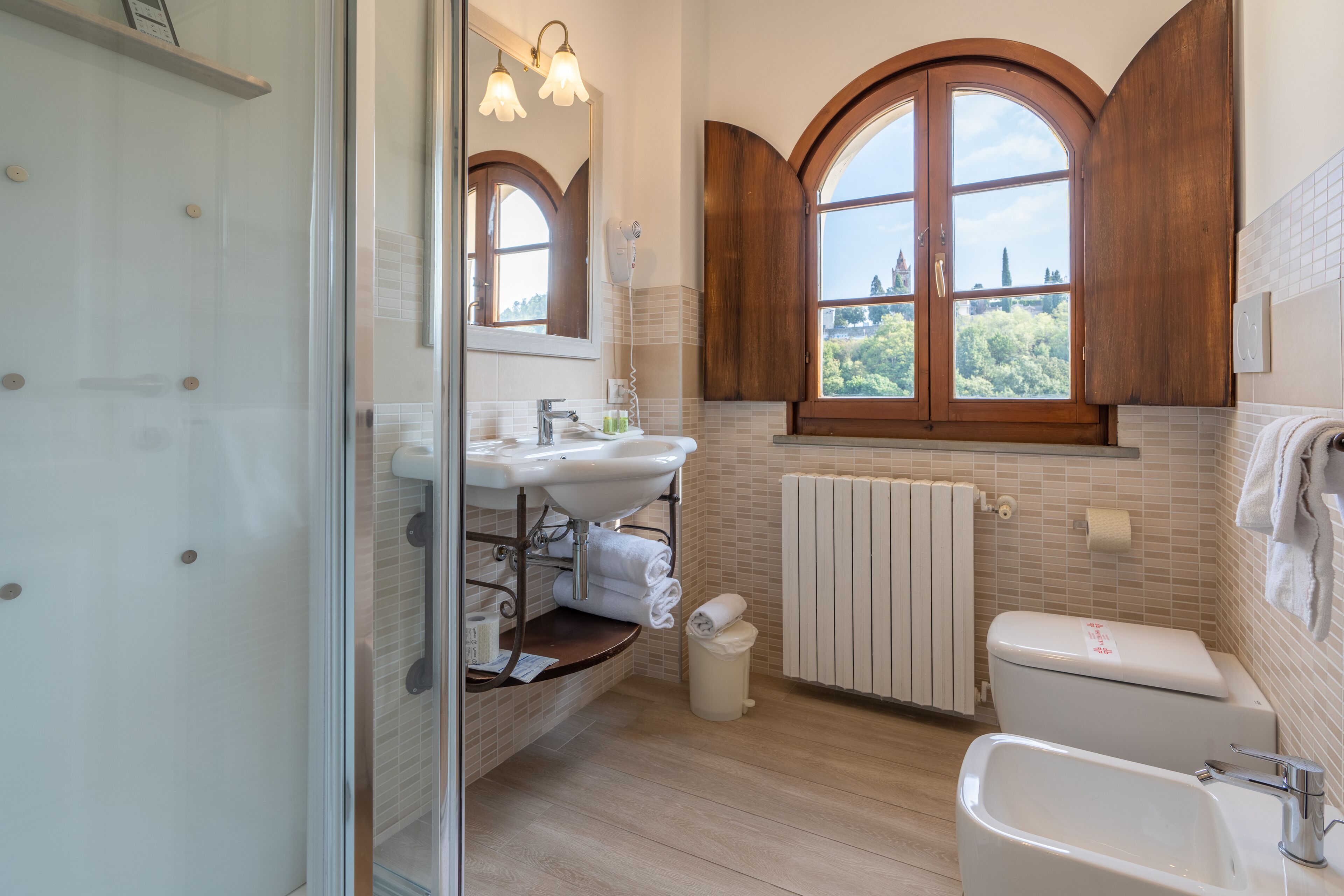 family room | bathroom | rainfall showerhead, free toiletries, hair dryer, bidet