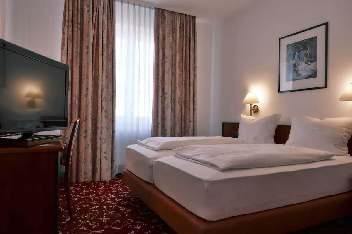 Double or Twin Room | Minibar, desk, blackout drapes, rollaway beds