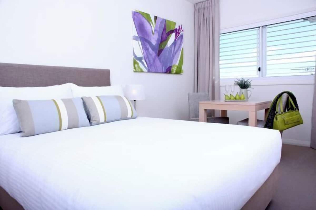 Premium bedding, Select Comfort beds, desk, blackout curtains