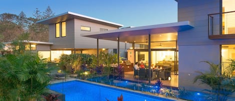 Outdoor pool, a heated pool, sun loungers