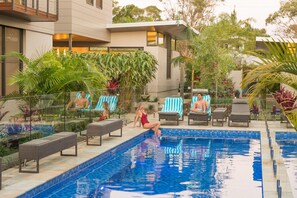 Outdoor pool, a heated pool, pool loungers - Byron Luxury Beach Houses (Byron Bay)