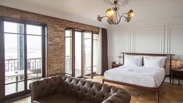 Panoramic Suite, Balcony, Sea View | Living area | TV