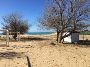 Private beach nearby, white sand, sun loungers, beach umbrellas