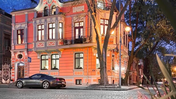 A historic building with a classic architectural style, featuring multiple balconies and large windows. - Guest Rooms Plovdiv (Plovdiv)