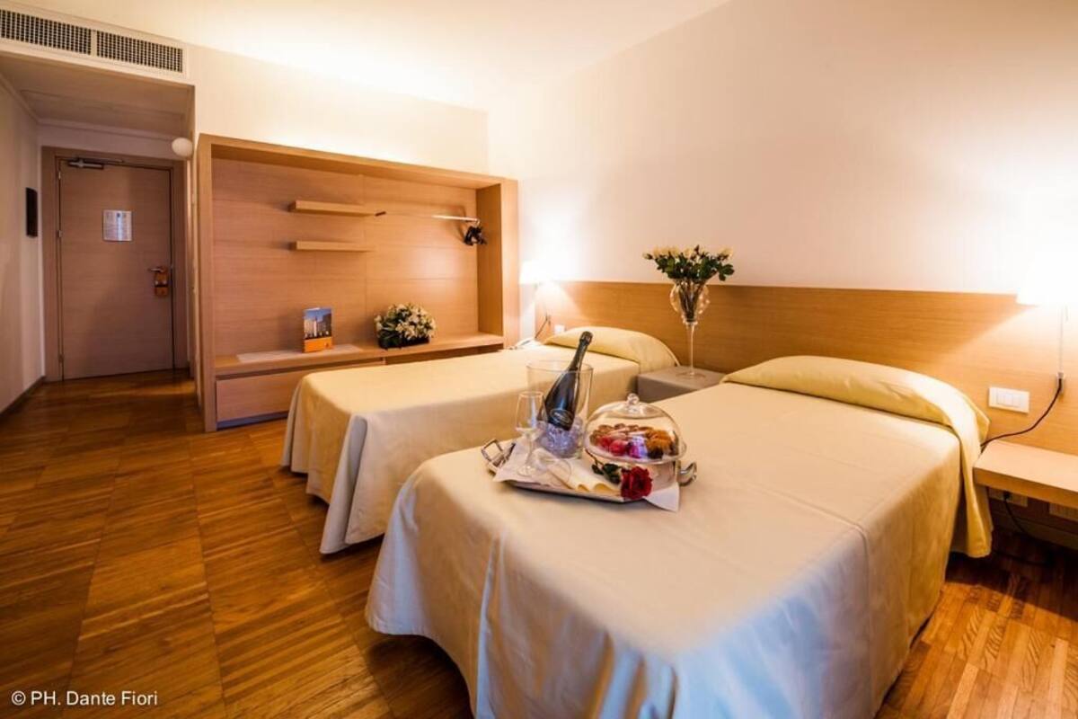 Twin Room, 2 Single Beds | Minibar, in-room safe, desk, laptop workspace