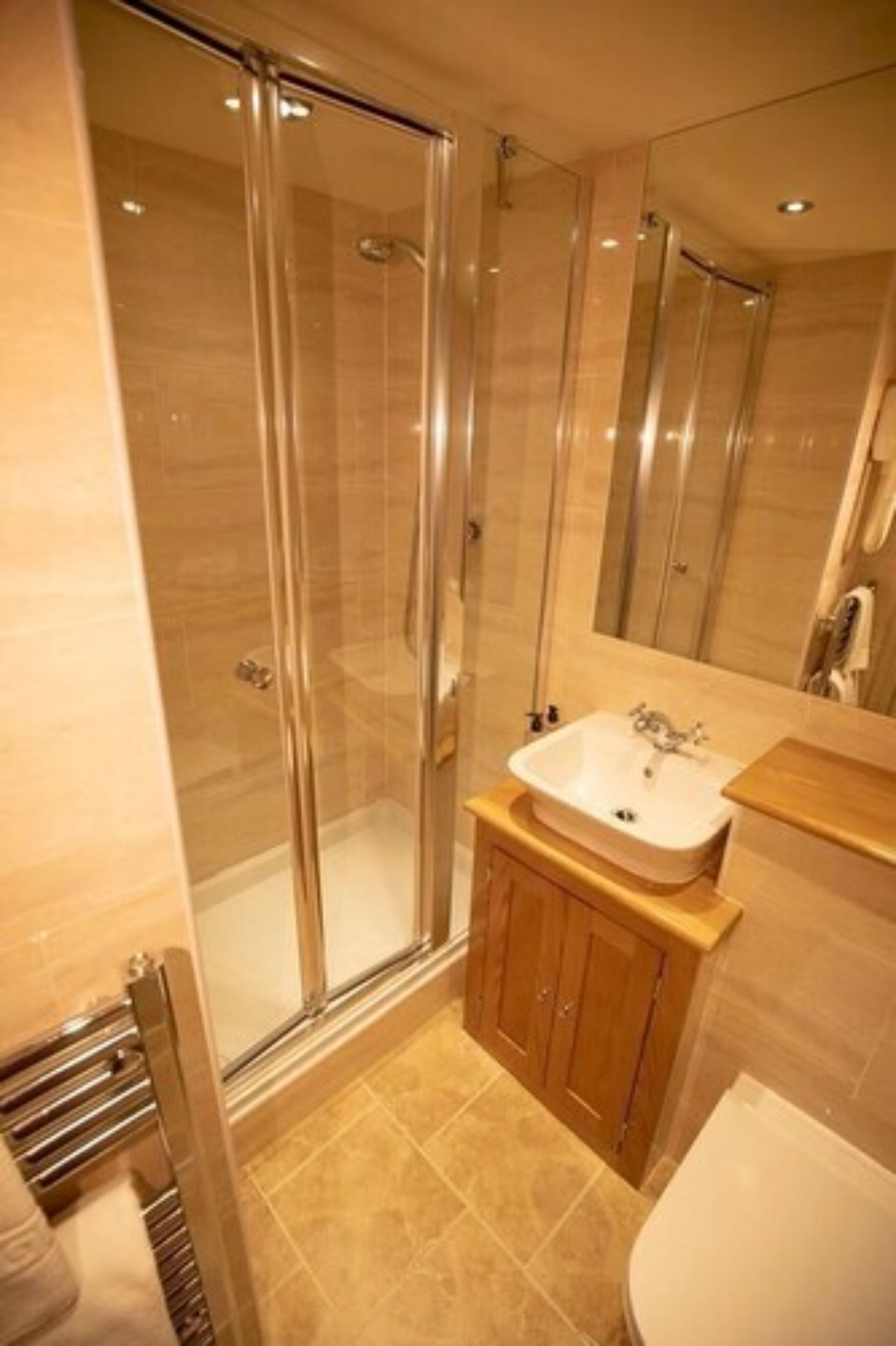 classic double room | bathroom | shower, rainfall showerhead, hair dryer, towels