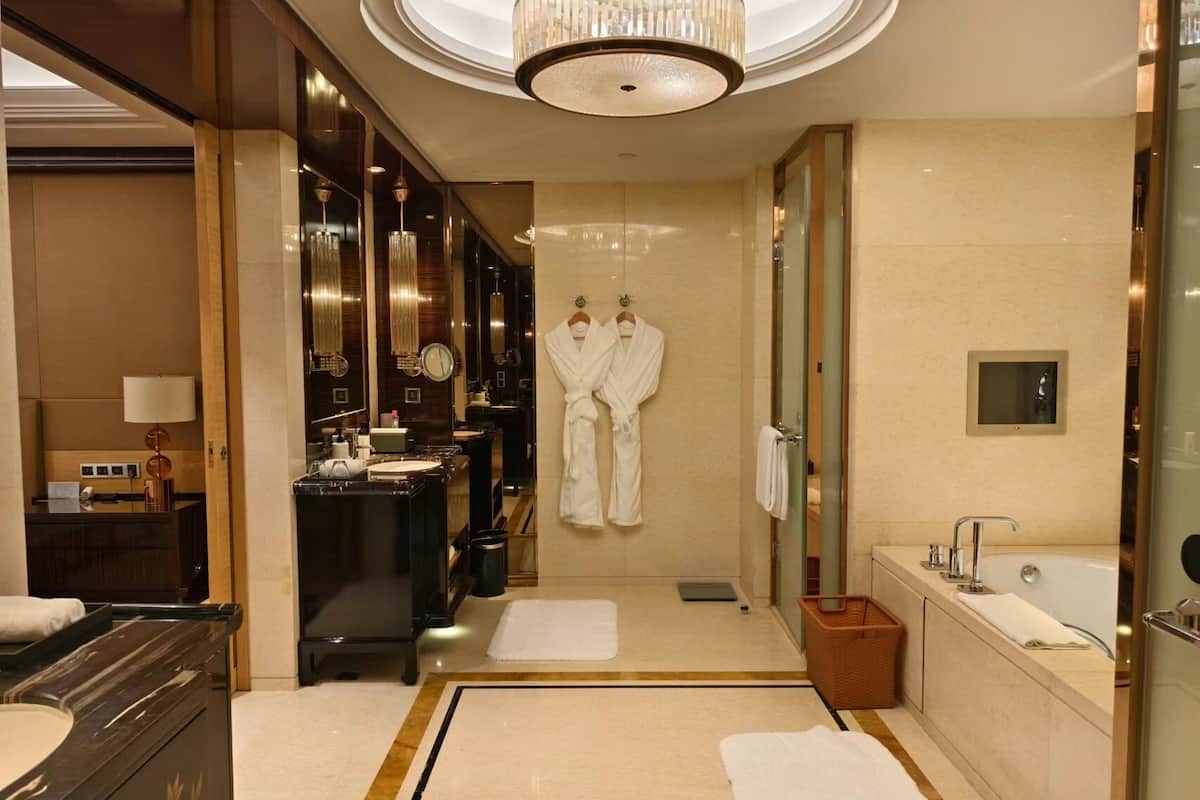 suite (ambassador) | bathroom | separate bathtub and shower, rainfall showerhead, designer toiletries