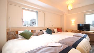 Deluxe Twin Triple Room, Non-smoking | Desk, blackout drapes, iron/ironing board, free WiFi
