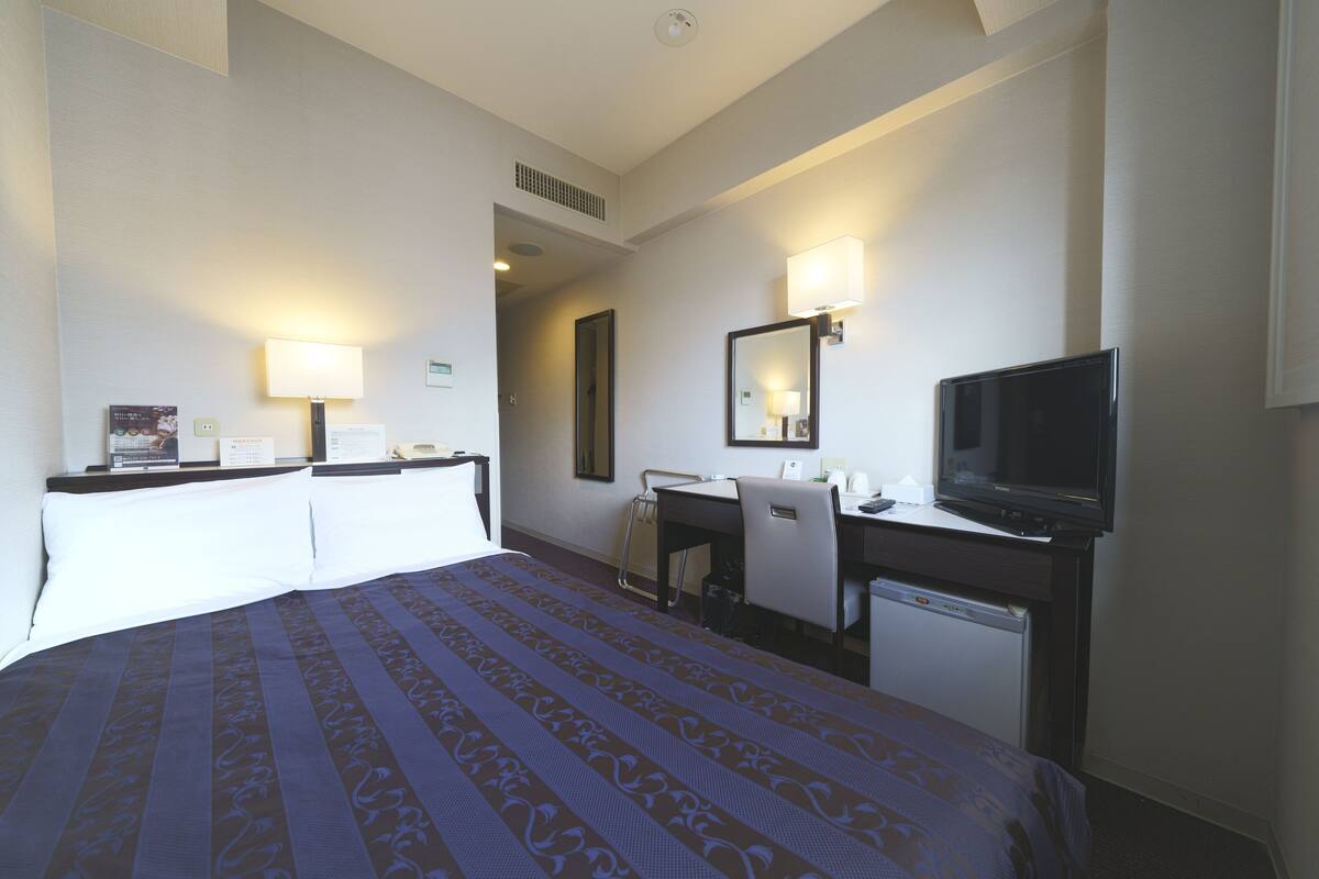 Desk, blackout curtains, iron/ironing board (on request), free WiFi