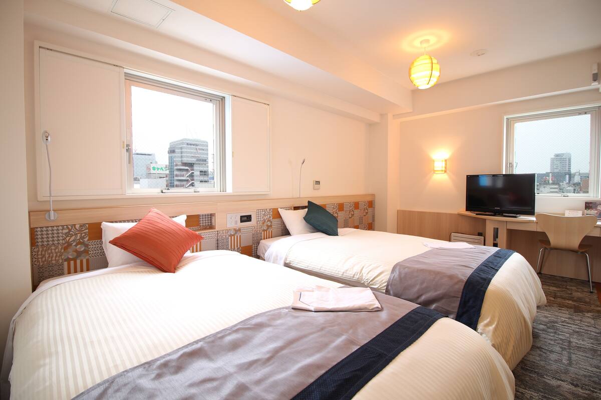 Desk, blackout curtains, iron/ironing board (on request), free WiFi