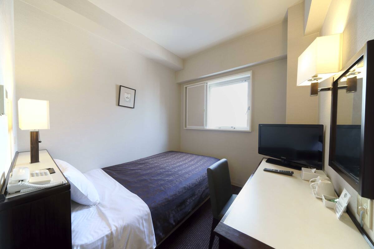 Desk, blackout curtains, iron/ironing board (on request), free WiFi