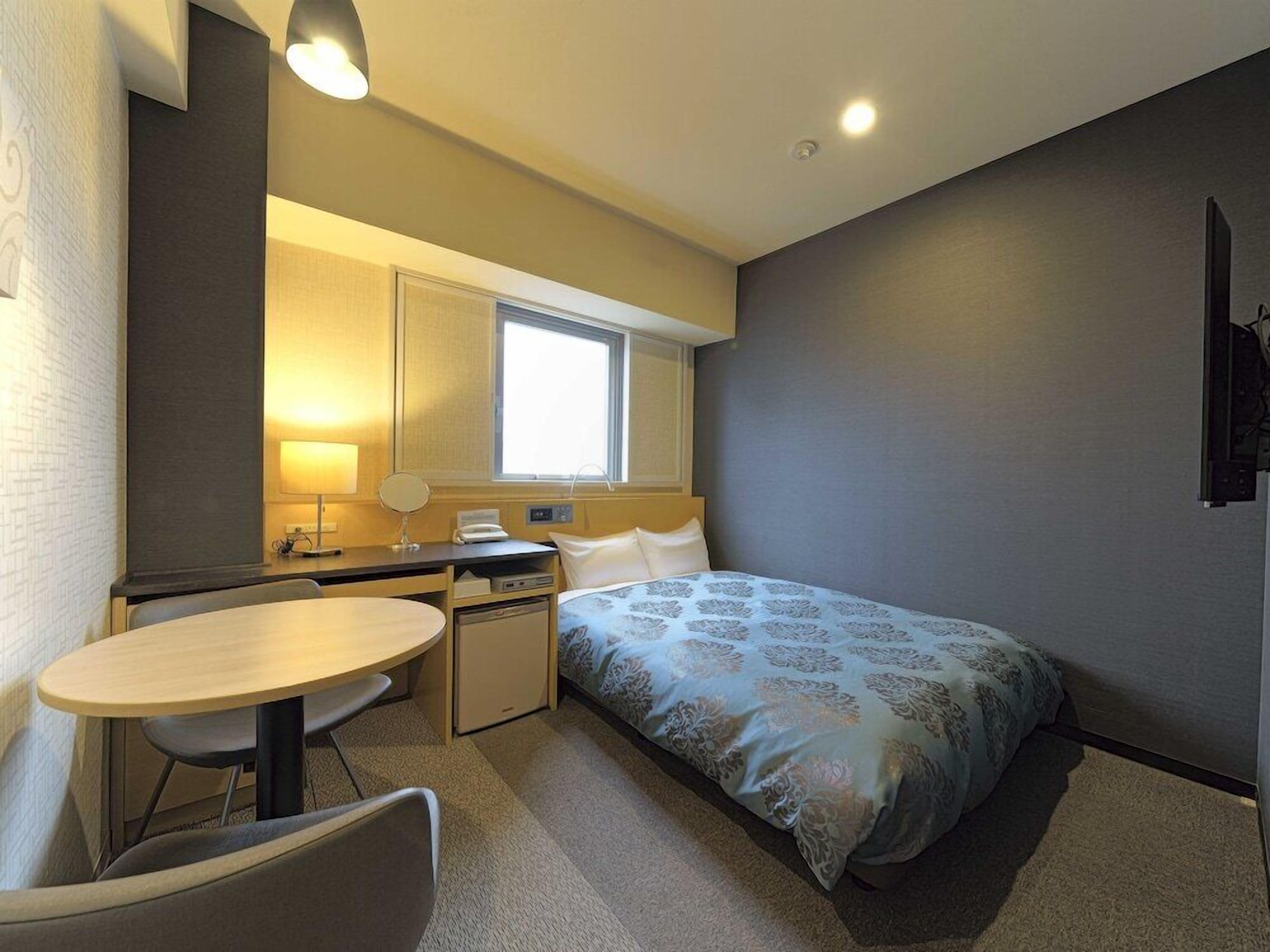 Desk, blackout drapes, soundproofing, iron/ironing board