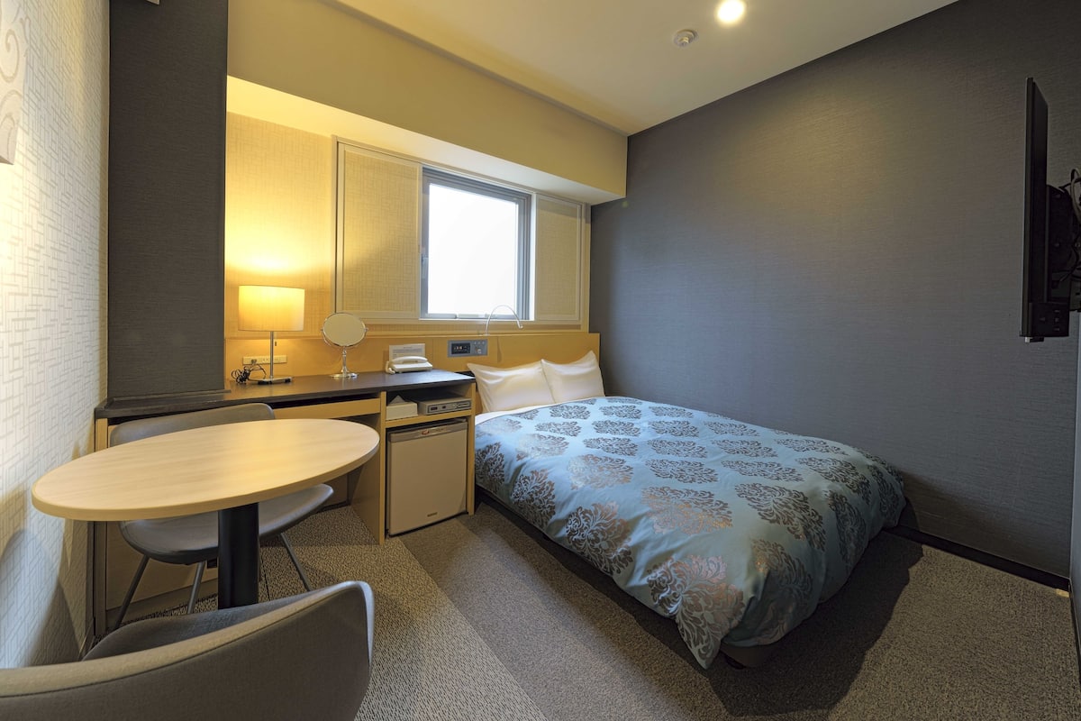 Desk, blackout drapes, soundproofing, iron/ironing board
