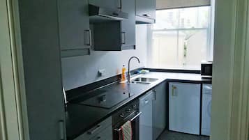 Standard Apartment, 1 Bedroom (Midships) | Private kitchen | Fridge, microwave, oven, stovetop