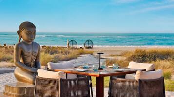 Private beach, beach umbrellas, beach towels