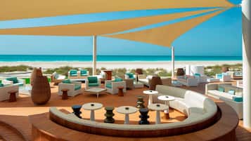 Private beach, beach umbrellas, beach towels