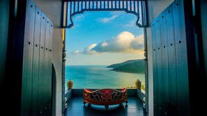 A balcony with a view of the sea and a mountainous landscape. - InterContinental Danang Sun Peninsula Resort by IHG (Da Nang)