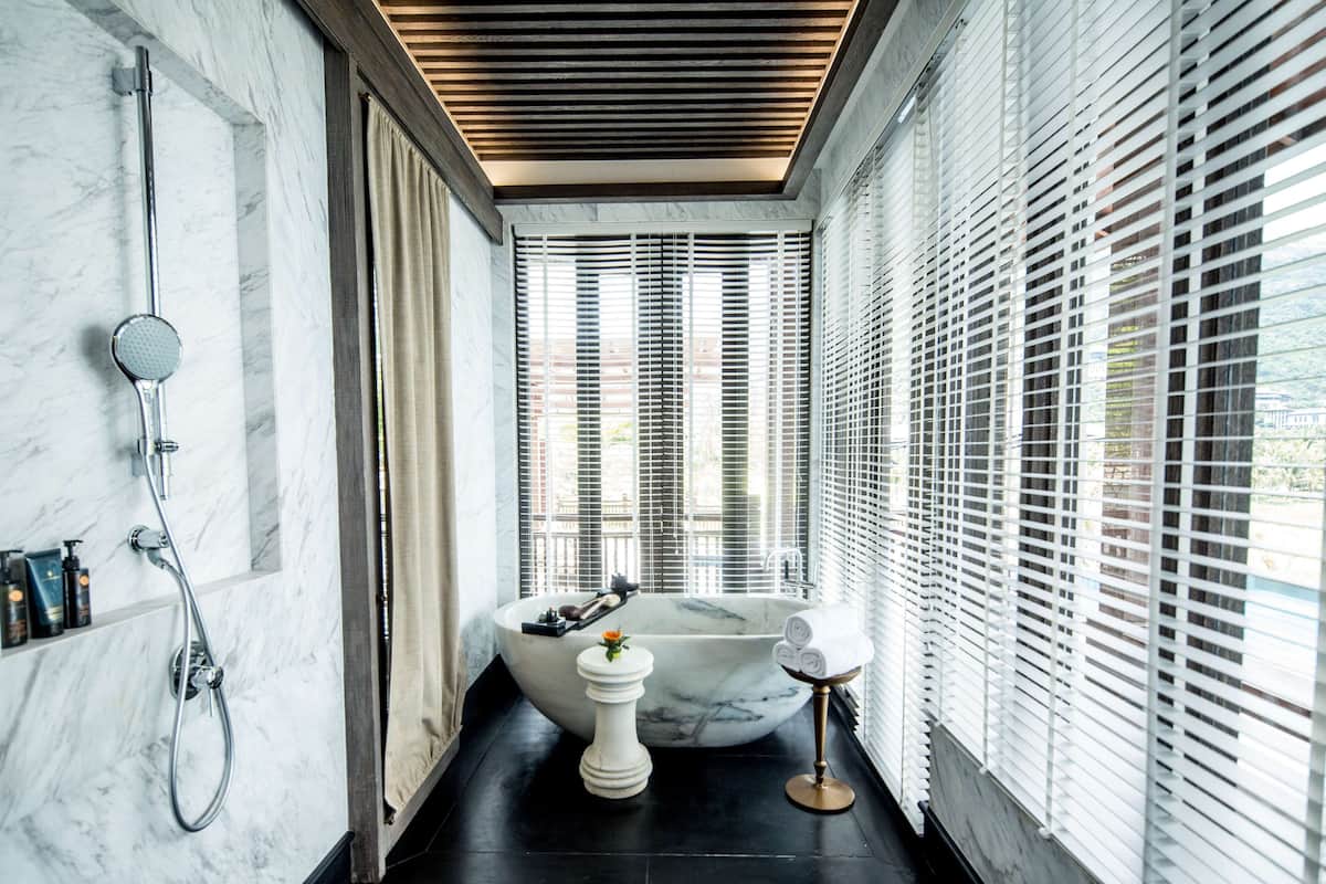 separate bathtub and shower, deep-soaking bathtub, rainfall showerhead