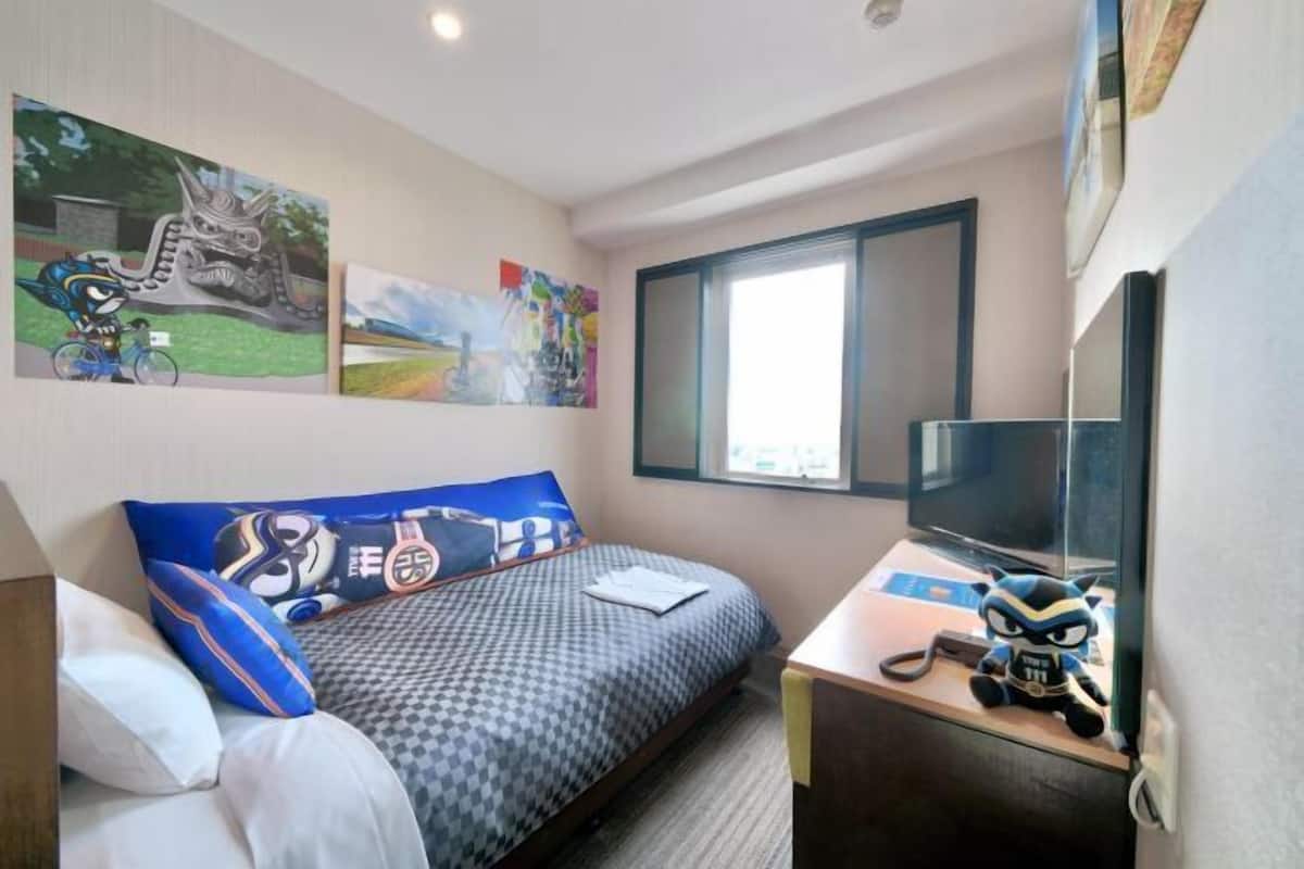 Down duvets, desk, laptop workspace, iron/ironing board
