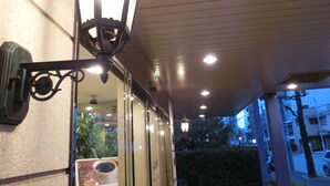 An entrance with a glass door, a signboard, and a ceiling with recessed lighting. - Meitetsu Inn Nagoya Kanayama (Nagoya)
