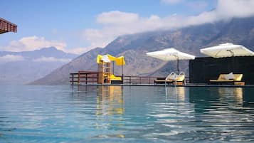 Outdoor pool, pool umbrellas, pool loungers