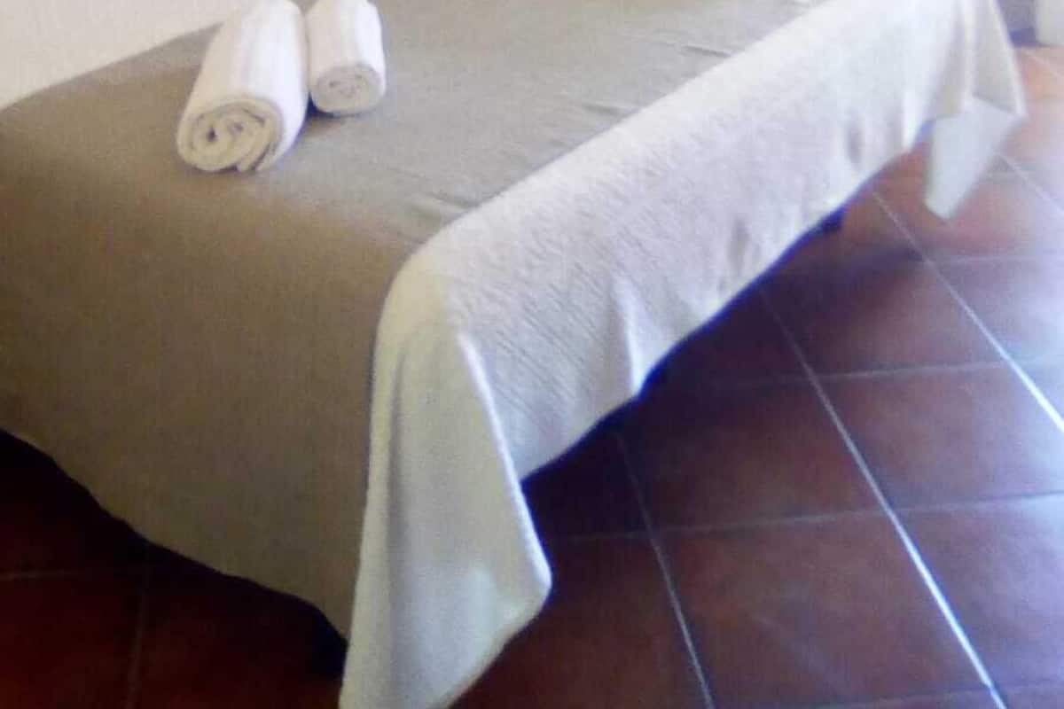 Italiaanse Frette-lakens, luxe beddengoed, donzen dekbedden