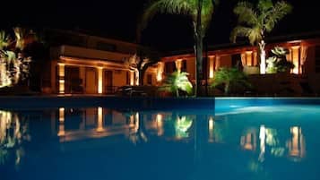 Outdoor pool, open 10:00 AM to 7:30 PM, pool umbrellas, pool loungers
