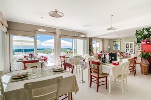 Breakfast, lunch, dinner served; Mediterranean cuisine, pool views